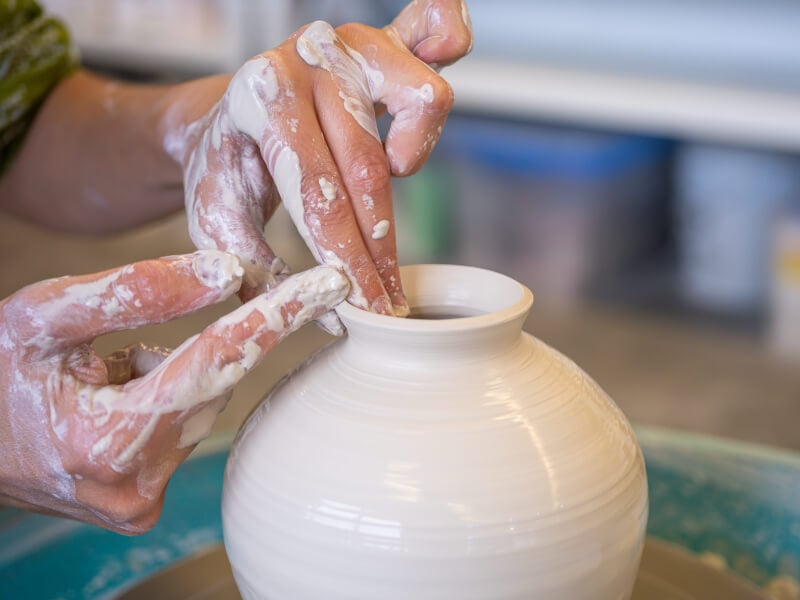 Wheel throwing a clay vase